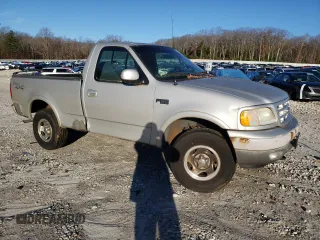 2002 Ford F-150 XL z VIN 1FTRF18212NA49764, wystawiony jako Copart lot #81626174 z przebiegiem Nie podano mil oraz Czysty tytuł • Clean title. Historia ofert i sprzedaży dostępna na DreamBid. Obrazek 4.