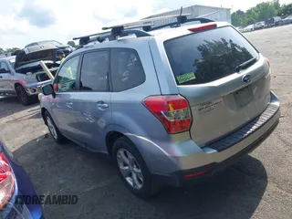 2014 Subaru Forester Premium with VIN JF2SJAGC0EH473208, listed as a IAAI auction lot 42800673 with 186,698 mi miles and . Bid and sale history available at DreamBid. Image 3.