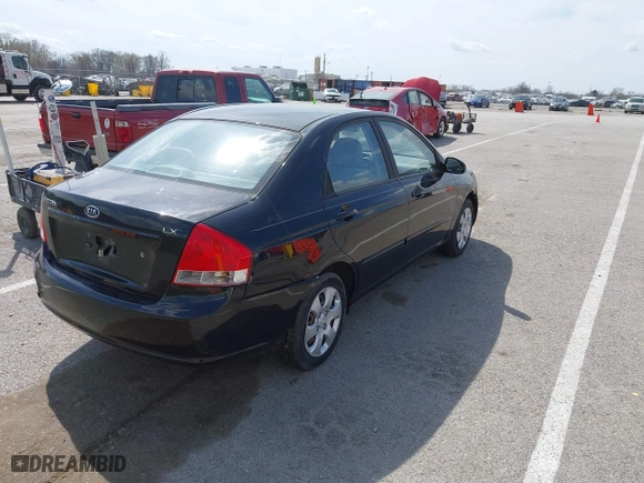 2009 Kia Spectra EX with VIN KNAFE221495631702, listed as a IAAI auction lot 41875896 with 234,550 mi miles. Bid and sale history available at carsss.com. Image 4.