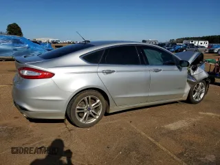 2016 Ford Fusion Titanium Hybrid with VIN 3FA6P0RU2GR114027, listed as a Copart auction lot 85223884 with Not provided miles and Salvage title. Bid and sale history available at DreamBid. Image 3.
