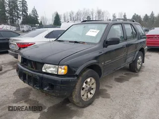 2000 Isuzu Rodeo z VIN 4S2DM58W5Y4327854, wystawiony jako IAAI lot #41288281 z przebiegiem 190 115 mil mil oraz . Historia ofert i sprzedaży dostępna na DreamBid. Obrazek 2.