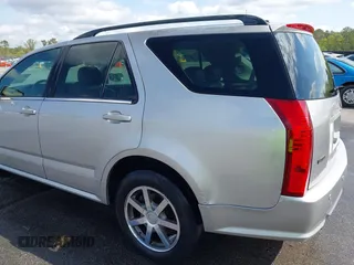 2004 Cadillac SRX with VIN 1GYDE63A740111607, listed as a IAAI auction lot 41918519 with 239,042 mi miles. Bid and sale history available at carsss.com. Image 6.