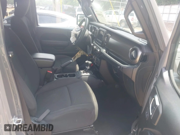 2023 Jeep Gladiator Sport S с VIN 1C6HJTAG7PL522721, выставлен на аукционе IAAI как лот 42594463 с пробегом 64 702 миль миль и . История ставок и продаж доступна на DreamBid. Изображение 5.