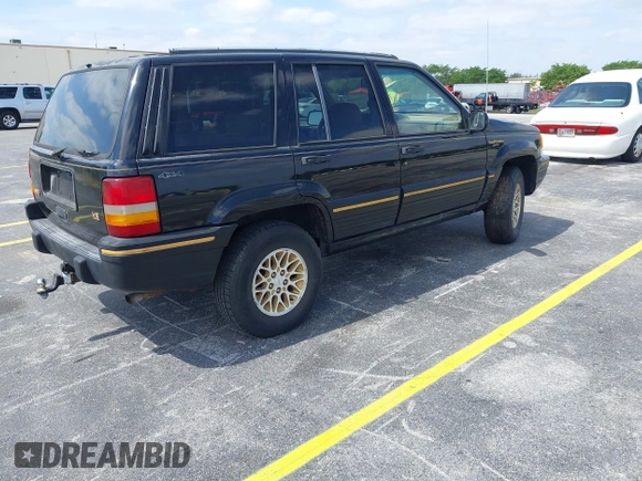1995 Jeep Grand Cherokee Limited with VIN 1J4GZ78Y0SC578277, listed as a IAAI auction lot 42082848 with 174,288 mi miles. Bid and sale history available at carsss.com. Image 4.