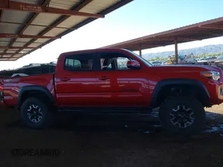 2018 Toyota Tacoma SR with VIN 3TMCZ5AN8JM141486, listed as a IAAI auction lot 42142145 with 54,851 mi miles and . Bid and sale history available at DreamBid. Image 13.