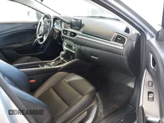 2017 Mazda Mazda6 Touring with VIN JM1GL1V50H1144637, listed as a IAAI auction lot 41849569 with 100,047 mi miles. Bid and sale history available at carsss.com. Image 5.