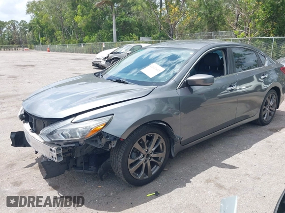 2018 Nissan Altima SV with VIN 1N4AL3AP8JC187535, listed as a IAAI auction lot 42147688 with 71,089 mi miles and . Bid and sale history available at carsss.com. Image 2.