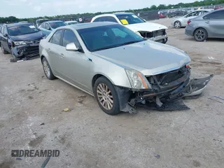 2013 Cadillac CTS Luxury with VIN 1G6DE5E55D0120843, listed as a IAAI auction lot 42145982 with 147,127 mi miles and . Bid and sale history available at DreamBid. Image 1.