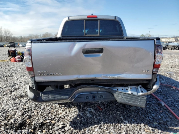 2014 Toyota Tacoma with VIN 3TMLU4EN4EM156401, listed as a Copart auction lot 46001045 with 124,289 mi miles and Salvage Title. Bid and sale history available at carsss.com. Image 6.
