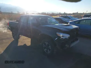 2016 Toyota Tacoma SR with VIN 3TMCZ5AN0GM023263, listed as a IAAI auction lot 41302069 with 137,276 mi miles. Bid and sale history available at carsss.com. Image 1.