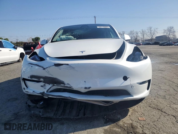 2024 Tesla Model Y with VIN 7SAYGDED1RF212974, listed as a Copart auction lot 44776005 with 16,841 mi miles and Salvage Title. Bid and sale history available at DreamBid. Image 5.