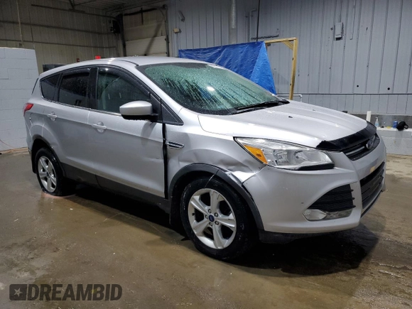 2014 Ford Escape SE with VIN 1FMCU9GX1EUC26584, listed as a Copart auction lot 49311145 with 130,545 mi miles and Salvage Title. Bid and sale history available at carsss.com. Image 4.
