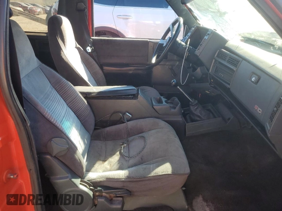1990 Chevrolet Blazer z VIN 1GNCS18Z2L8113073, wystawiony jako Copart lot #87676865 z przebiegiem 22 827 mil mil oraz Szkoda całkowita • Salvage title. Historia ofert i sprzedaży dostępna na DreamBid. Obrazek 7.