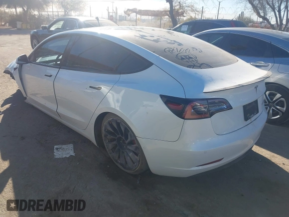 2021 Tesla Model 3 Performance with VIN 5YJ3E1EC6MF926448, listed as a IAAI auction lot 41240309 with 39,386 mi miles and . Bid and sale history available at DreamBid. Image 3.