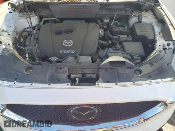 2018 Mazda CX-5 Grand Touring с VIN JM3KFADM3J1351532, выставлен на аукционе Copart как лот 55567405 с пробегом 99 134 миль миль и Списание • Salvage title. История ставок и продаж доступна на DreamBid. Изображение 11.
