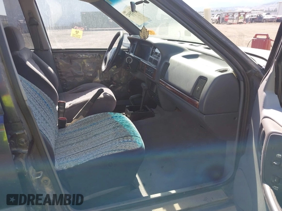 1997 Jeep Grand Cherokee Laredo z VIN 1J4GZ58Y2VC551199, wystawiony jako IAAI lot #42625502 z przebiegiem 210 722 mil mil oraz . Historia ofert i sprzedaży dostępna na DreamBid. Obrazek 5.