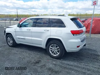 2017 Jeep Grand Cherokee Overland with VIN 1C4RJFCG6HC617770, listed as a IAAI auction lot 42041810 with 119,125 mi miles and . Bid and sale history available at DreamBid. Image 14.
