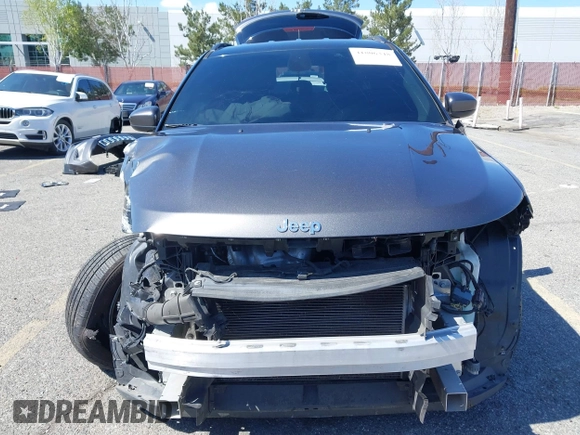 2020 Jeep Compass Altitude with VIN 3C4NJCBB0LT134047, listed as a IAAI auction lot 41806348 with 70,533 mi miles and . Bid and sale history available at carsss.com. Image 6.