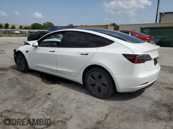 2023 Tesla Model 3 with VIN 5YJ3E1EA8PF499535, listed as a Copart auction lot 59974115 with 18,365 mi miles and Salvage title. Bid and sale history available at DreamBid. Image 2.