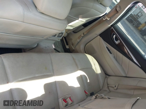 2014 Infiniti Q50 Premium with VIN JN1BV7AP3EM680901, listed as a IAAI auction lot 42143210 with 205,625 mi miles and . Bid and sale history available at carsss.com. Image 8.