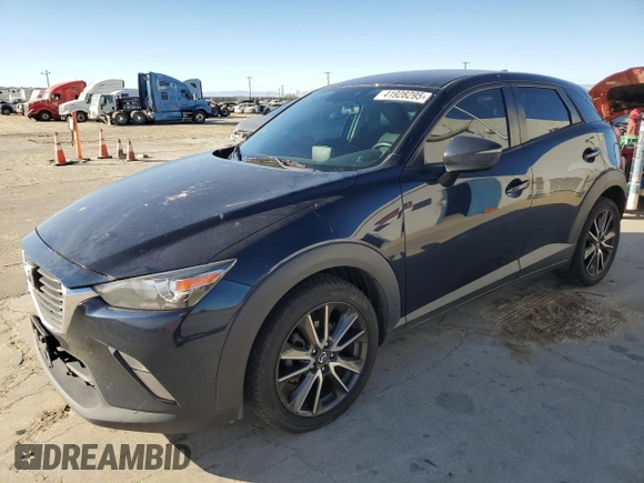 2017 Mazda CX-3 Touring z VIN JM1DKDC74H0165654, wystawiony jako Copart lot #41928295 z przebiegiem 173 567 mil mil oraz Szkoda całkowita • Salvage title. Historia ofert i sprzedaży dostępna na DreamBid. Obrazek 1.
