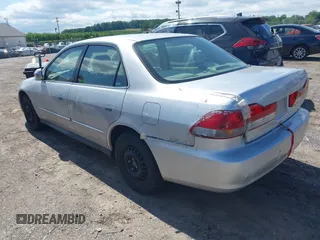 2002 Honda Accord LX with VIN JHMCG66542C012795, listed as a IAAI auction lot 42295547 with 155,174 mi miles and . Bid and sale history available at DreamBid. Image 3.