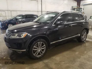 2016 Volkswagen Touareg Sport with VIN WVGEF9BP5GD012758, listed as a Copart auction lot 85434084 with 111,746 mi miles and Salvage Title. Bid and sale history available at DreamBid. Image 1.