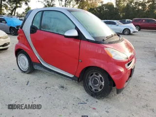 2011 Smart fortwo Pure с VIN WMEEJ3BAXBK421243, выставлен на аукционе Copart как лот 78536584 с пробегом 64 858 миль миль и На запчасти • Non repairable. История ставок и продаж доступна на DreamBid. Изображение 4.
