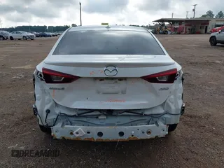 2014 Mazda 3 S Touring with VIN JM1BM1V31E1208377, listed as a IAAI auction lot 42388524 with 122,124 mi miles and . Bid and sale history available at DreamBid. Image 6.