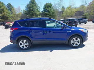 2016 Ford Escape SE with VIN 1FMCU9GX1GUB28870, listed as a IAAI auction lot 42129628 with 113,909 mi miles. Bid and sale history available at carsss.com. Image 13.