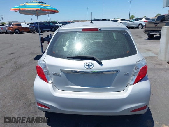 2012 Toyota Yaris L z VIN JTDKTUD3XCD533644, wystawiony jako IAAI lot #42286777 z przebiegiem 149 185 mil mil oraz . Historia ofert i sprzedaży dostępna na DreamBid. Obrazek 13.