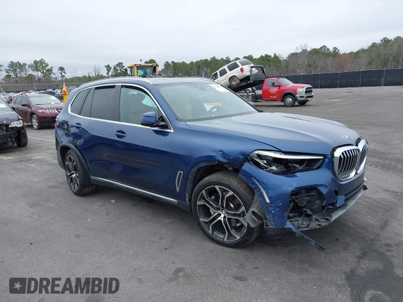 2021 BMW X5 sDrive40i with VIN 5UXCR4C0XM9G16295, listed as a IAAI auction lot 41534953 with 28,722 mi miles. Bid and sale history available at carsss.com. Image 1.