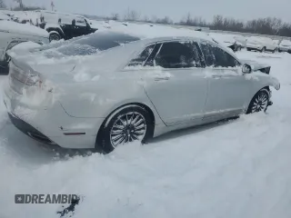 2015 Lincoln MKZ z VIN 3LN6L2JK7FR608177, wystawiony jako Copart lot #85162384 z przebiegiem Nie podano mil oraz Czysty tytuł • Clean title. Historia ofert i sprzedaży dostępna na DreamBid. Obrazek 3.
