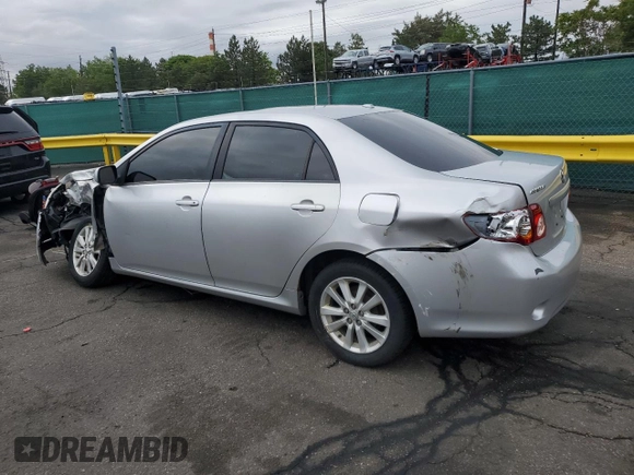 2010 Toyota Corolla with VIN 1NXBU4EE0AZ211178, listed as a Copart auction lot 59043055 with 182,374 mi miles and Salvage title. Bid and sale history available at DreamBid. Image 2.