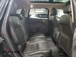 2015 Ford Escape Titanium with VIN 1FMCU9J96FUA43340, listed as a Copart auction lot 55756395 with 142,039 mi miles and Salvage Title. Bid and sale history available at DreamBid. Image 11.