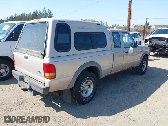 1997 Ford Ranger XLT with VIN 1FTCR15X0VPA25106, listed as a IAAI auction lot 42061204 with 173,022 mi miles. Bid and sale history available at carsss.com. Image 4.