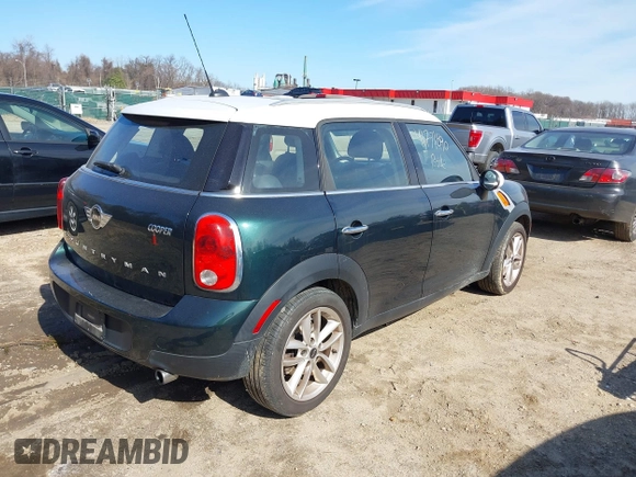 2013 MINI Countryman with VIN WMWZB3C57DWR35414, listed as a IAAI auction lot 41771890 with 141,561 mi miles and . Bid and sale history available at DreamBid. Image 4.