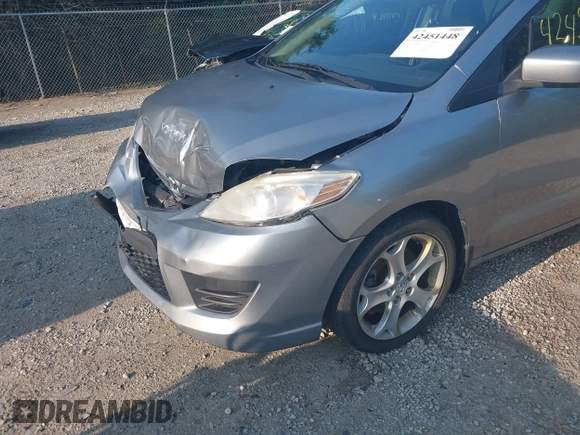 2010 Mazda 5 Sport with VIN JM1CR2W32A0385045, listed as a IAAI auction lot 42451448 with 127,762 mi miles and . Bid and sale history available at DreamBid. Image 18.
