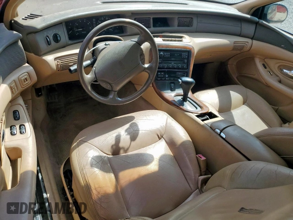 1997 Lincoln Mark VIII with VIN 1LNLM91V7VY638752, listed as a Copart auction lot 53286455 with 126,803 mi miles and Salvage Title. Bid and sale history available at DreamBid. Image 8.