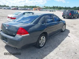 2014 Chevrolet Impala LT with VIN 2G1WB5E31E1146318, listed as a IAAI auction lot 40413281 with 422,345 mi miles and . Bid and sale history available at DreamBid. Image 4.