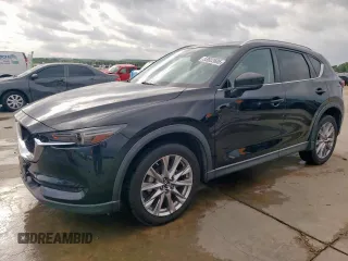2019 Mazda CX-5 Grand Touring with VIN JM3KFADM6K0540439, listed as a Copart auction lot 53922605 with 119,652 mi miles and Clean title. Bid and sale history available at DreamBid. Image 1.