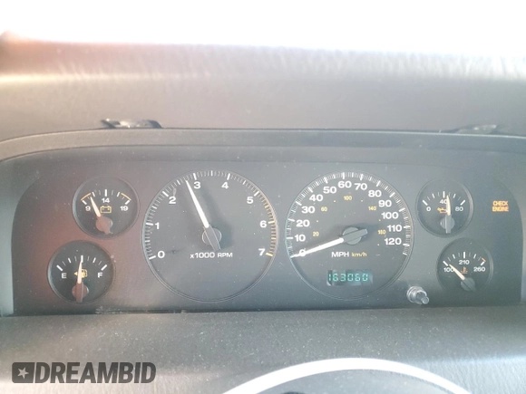 1999 Jeep Grand Cherokee Laredo with VIN 1J4GW58NXXC776438, listed as a Copart auction lot 84412044 with 163,060 mi miles and Salvage title. Bid and sale history available at DreamBid. Image 9.