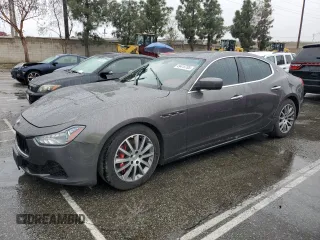 2015 Maserati Ghibli S Q4 with VIN ZAM57RTA8F1133209, listed as a Copart auction lot 49415705 with 65,100 mi miles and Salvage Title. Bid and sale history available at carsss.com. Image 1.