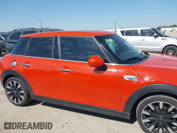 2019 MINI Hardtop 4 Door Cooper S with VIN WMWXU3C57K2B64946, listed as a IAAI auction lot 42240647 with 87,704 mi miles and . Bid and sale history available at DreamBid. Image 13.