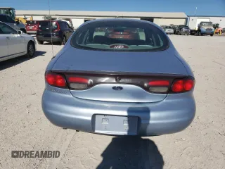 1998 Ford Taurus LX z VIN 1FAFP52U5WA273382, wystawiony jako Copart lot #77102854 z przebiegiem 73 014 mil mil oraz Szkoda całkowita • Salvage title. Historia ofert i sprzedaży dostępna na DreamBid. Obrazek 6.