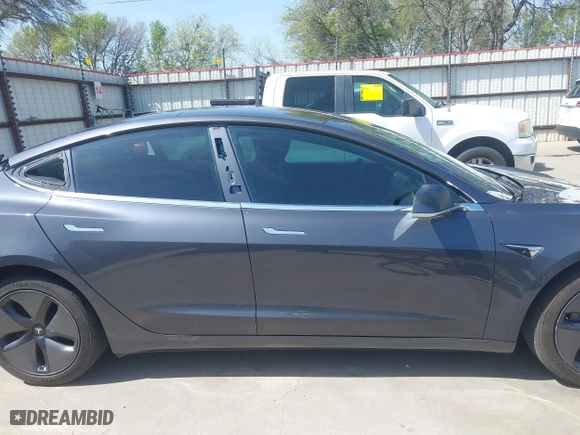 2018 Tesla Model 3 Long Range Battery with VIN 5YJ3E1EA4JF157782, listed as a IAAI auction lot 41774169 with 123,239 mi miles. Bid and sale history available at carsss.com. Image 14.