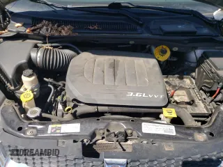 2014 Dodge Grand Caravan American Value with VIN 2C4RDGBG5ER248322, listed as a Copart auction lot 55160615 with Not Provided miles and Clean Title. Bid and sale history available at DreamBid. Image 12.