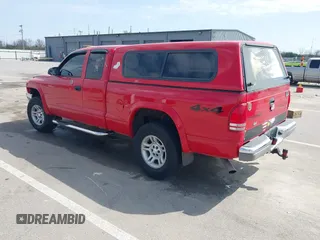 2003 Dodge Dakota z VIN 1D7HG42X93S296117, wystawiony jako IAAI lot #42045149 z przebiegiem 161 725 mil mil oraz . Historia ofert i sprzedaży dostępna na DreamBid. Obrazek 3.