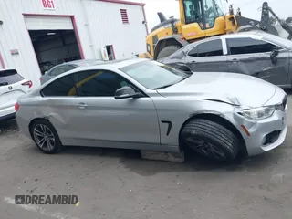 2015 BMW 4 Series 428i z VIN WBA3N7C50FK222398, wystawiony jako IAAI lot #42211723 z przebiegiem 149 853 mil mil oraz . Historia ofert i sprzedaży dostępna na DreamBid. Obrazek 13.