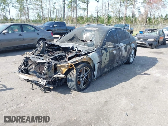2015 BMW 5 Series 535i xDrive with VIN WBA5B3C58FD544141, listed as a IAAI auction lot 41702930 with 1 mi miles. Bid and sale history available at carsss.com. Image 2.